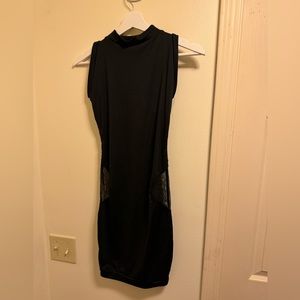 Fitted black mini with sheer panels